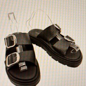 The Christian Riccio Italy Women's Sandals in size 8M are a stylish and comforta